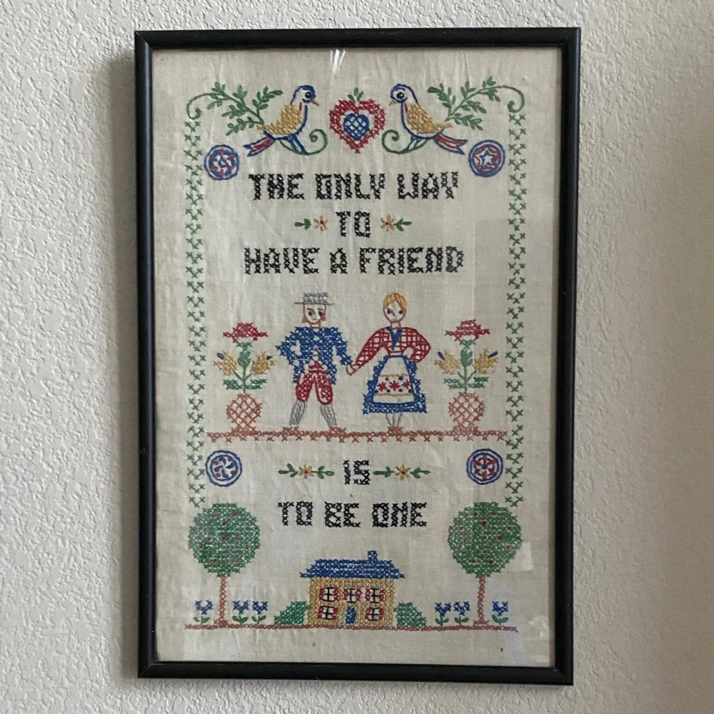 Black Framed Cross-Stitch. Vintage, hand stiched quote done in folk art style.